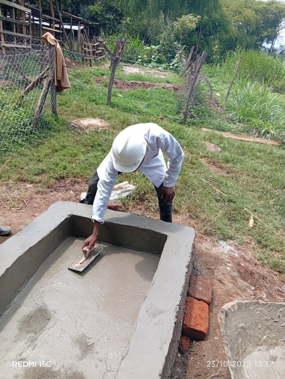 Development of dairy farm structure (Water Trough), by Dairy attendance Trainees.